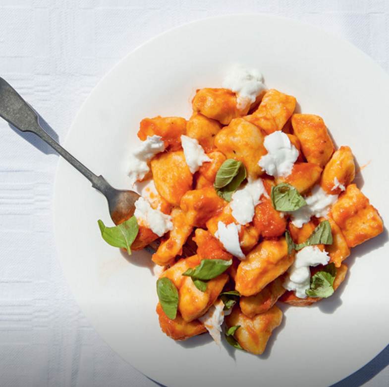 Potato gnocchi with tomato sauce, mozzarella & basil