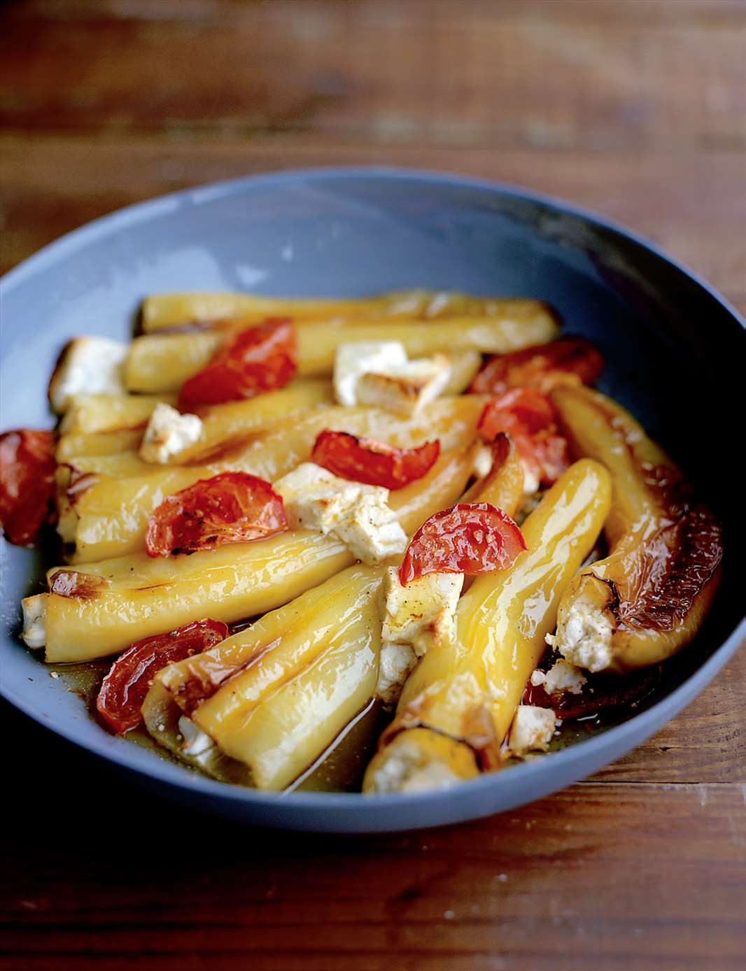 Long yellow peppers stuffed with feta